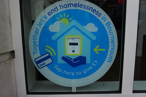 Bournemouth Echo: The contactless giving point, developed by the Homelessness Partnership, outside the HSBC branch at Beale Place in Bournemouth 